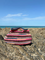 Sac Marius multicolore de Le Vestiaire avec poignées en cuir et design coloré, vue de face sur fond neutre.
